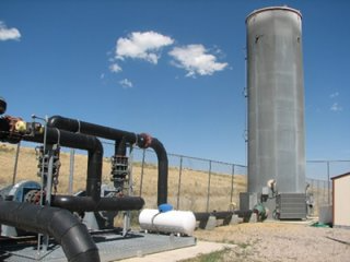 Enclosed flare tower at a landfill